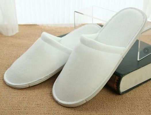 Fábrica mayorista desechable Waffle de alta calidad zapatillas de hotel servicios de baño